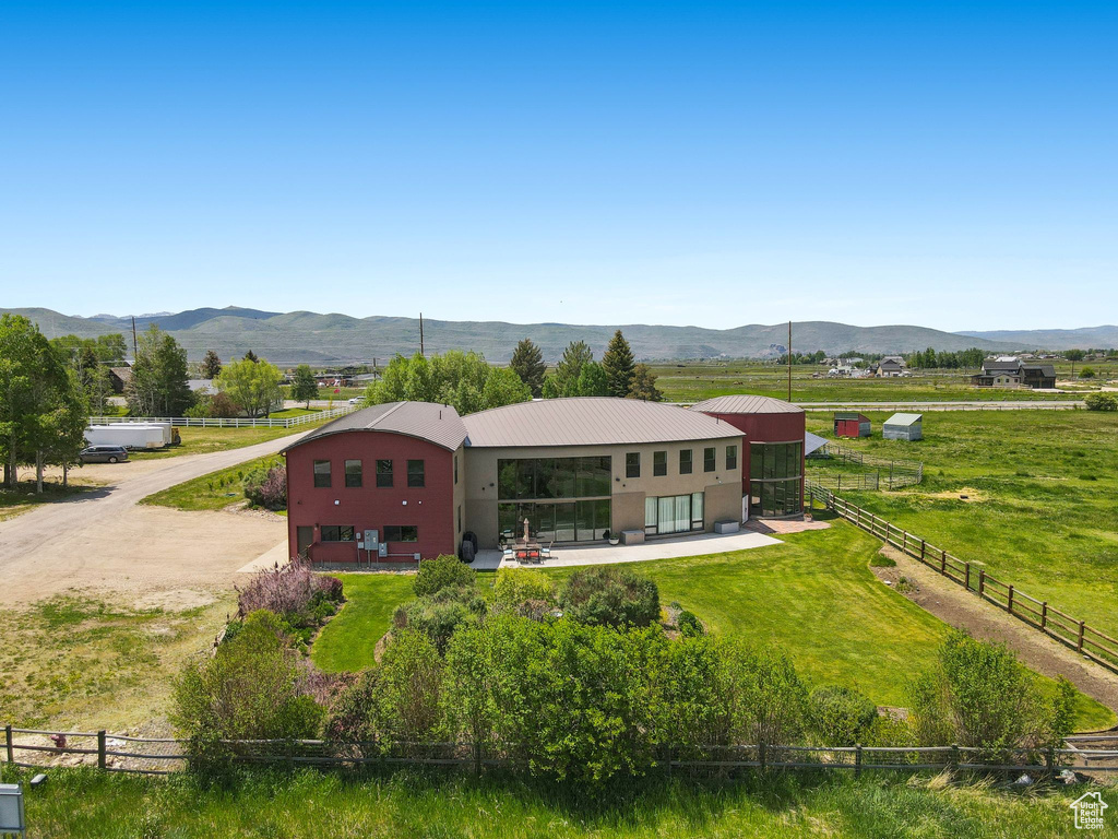 View of rural area with a mountain backdrop