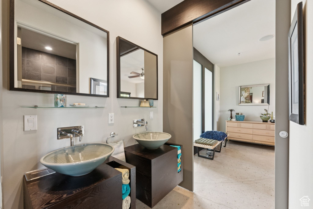 Bathroom featuring two vanities