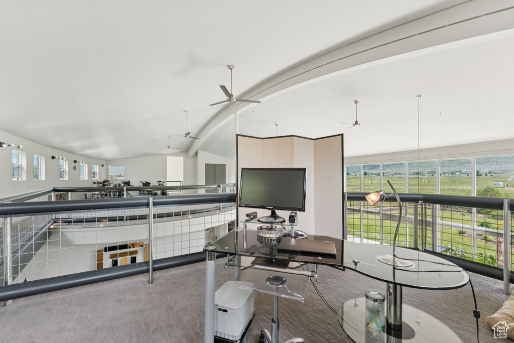 Office area featuring carpet flooring and ceiling fan