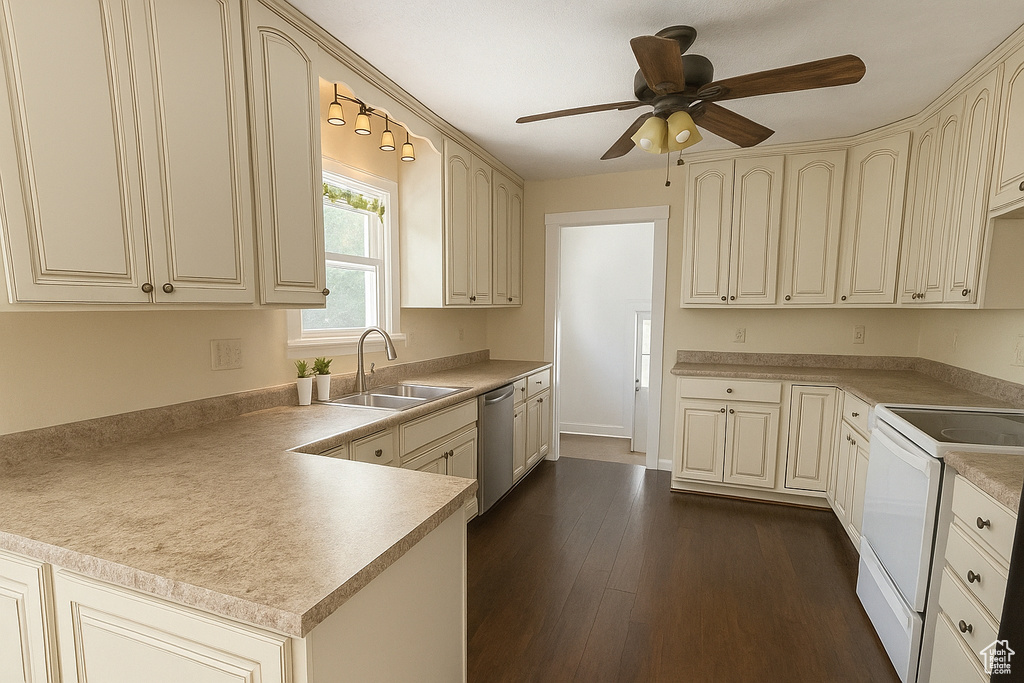 Kitchen featuring electric stove, stainless steel dishwasher, a peninsula, ceiling fan, and cream cabinetry