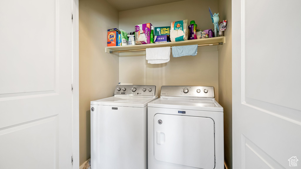 Laundry area featuring independent washer and dryer