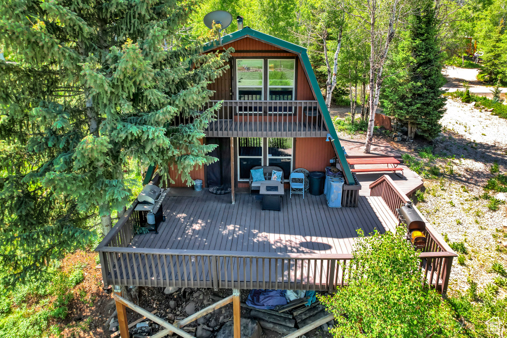 Wooden deck featuring grilling area