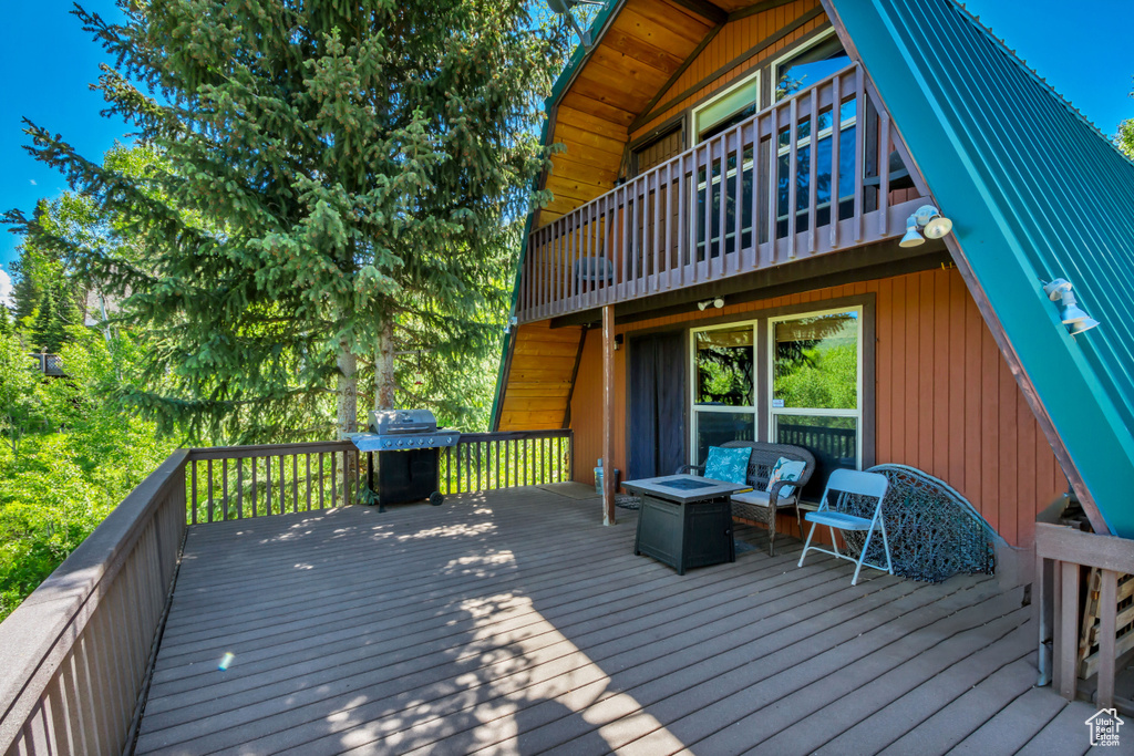 Wooden terrace with area for grilling
