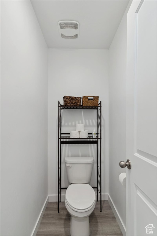 Bathroom featuring wood finished floors