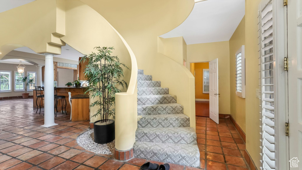 Stairs with arched walkways and ornate columns