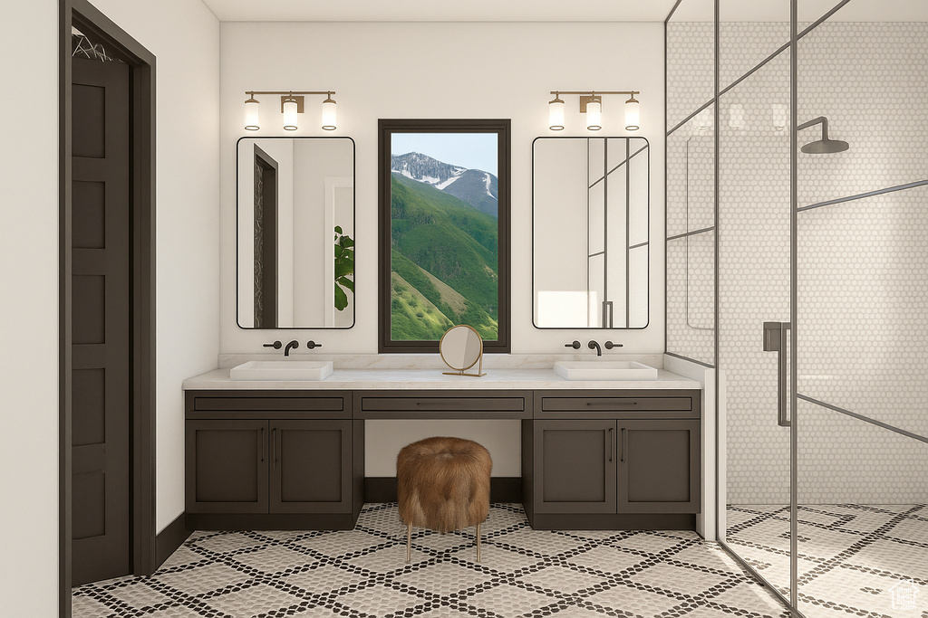 Bathroom featuring a shower stall, a mountain view, double vanity, and tile patterned floors