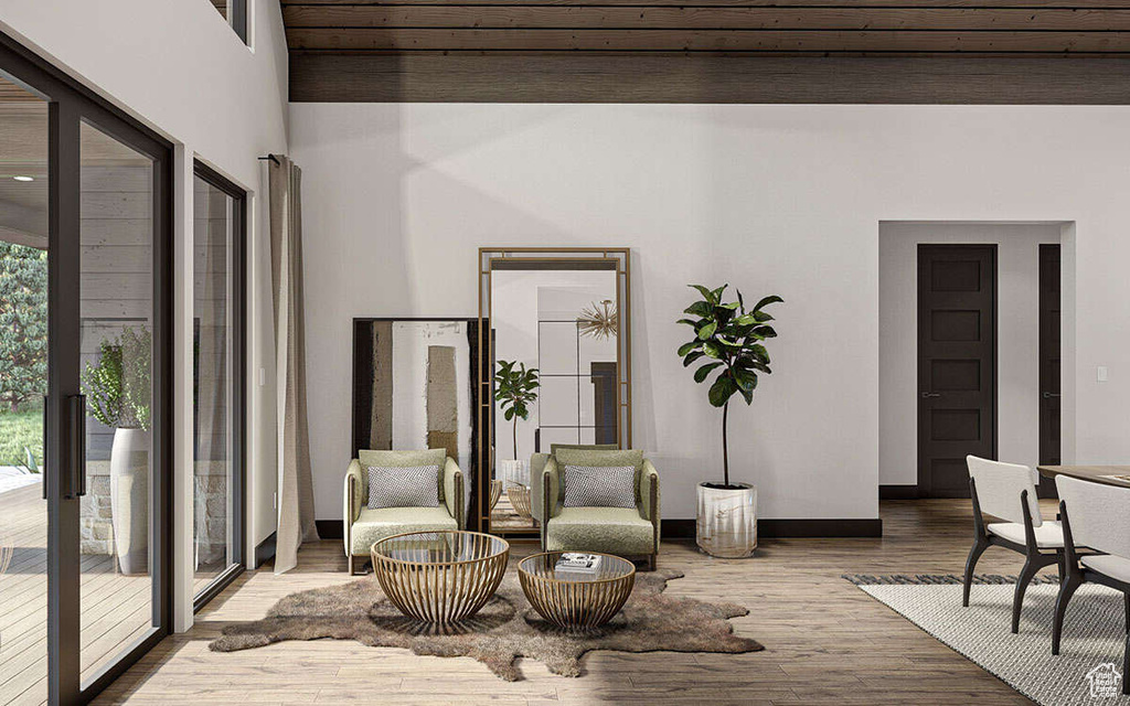 Living area featuring wood finished floors and baseboards