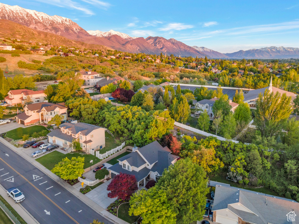 Aerial view of residential area featuring mountains