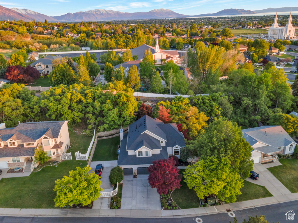 Aerial view of residential area featuring mountains