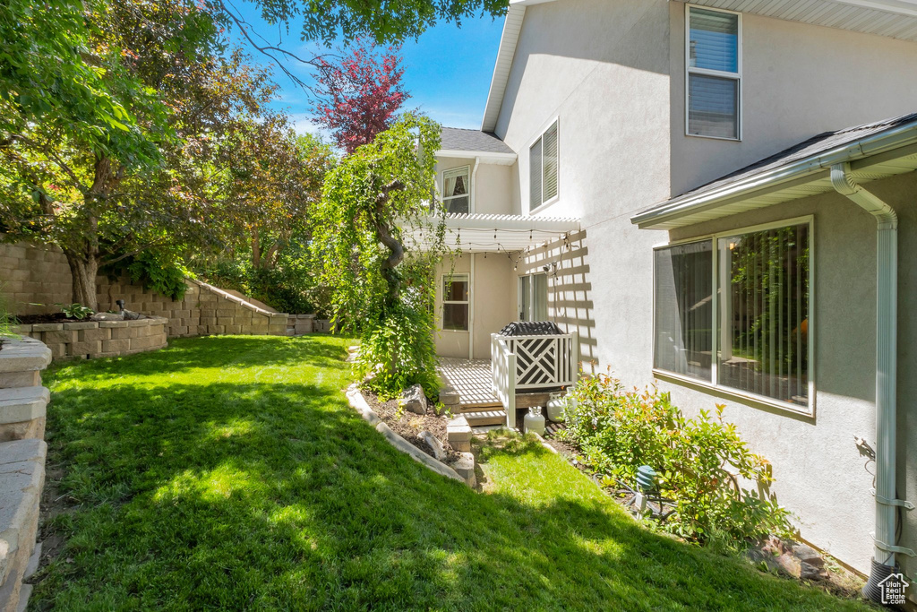 View of yard with a pergola