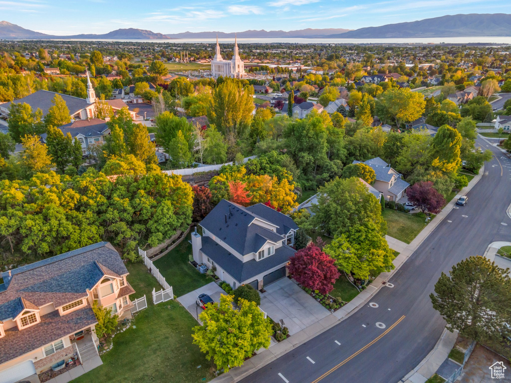 Aerial perspective of suburban area with a mountain backdrop