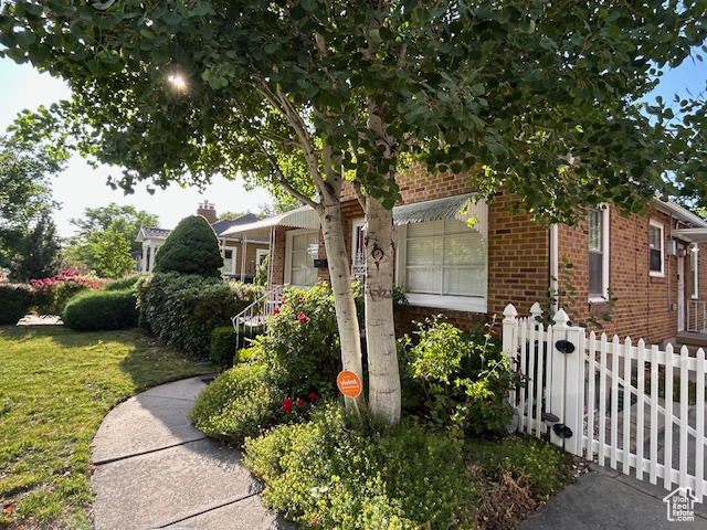 View of home's exterior featuring brick siding