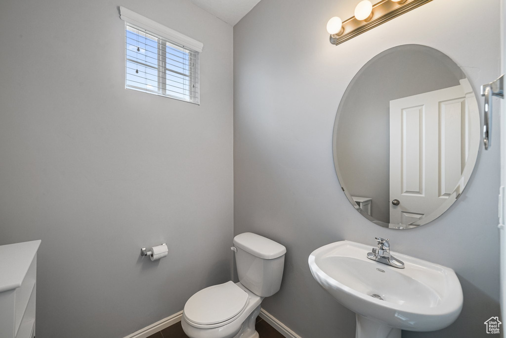 Bathroom with a sink and toilet