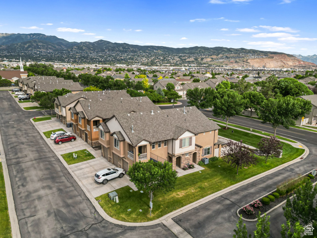 Aerial perspective of suburban area with mountains