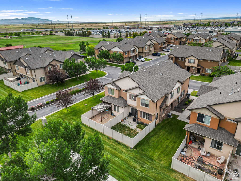 Aerial view of residential area with mountains