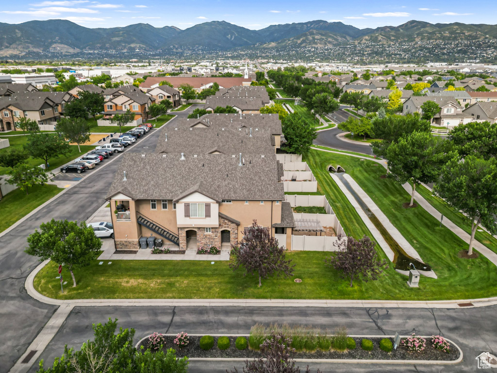 Aerial view of residential area with a mountainous background