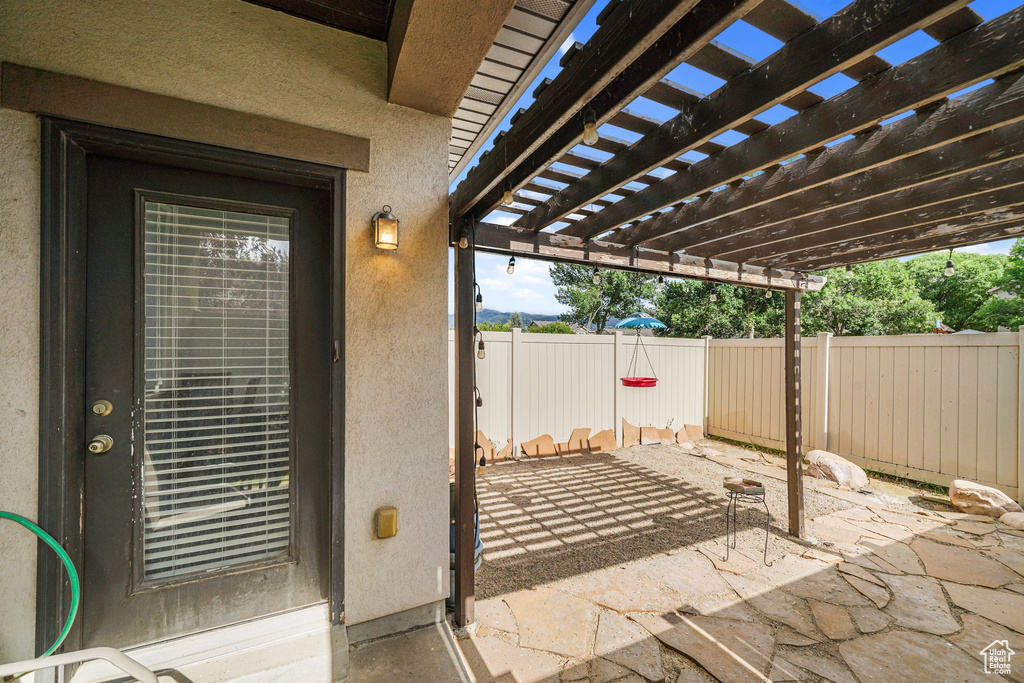 View of patio with a pergola