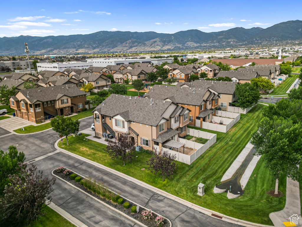 Aerial view of residential area with a mountainous background