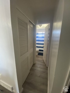 Hall featuring light wood finished floors