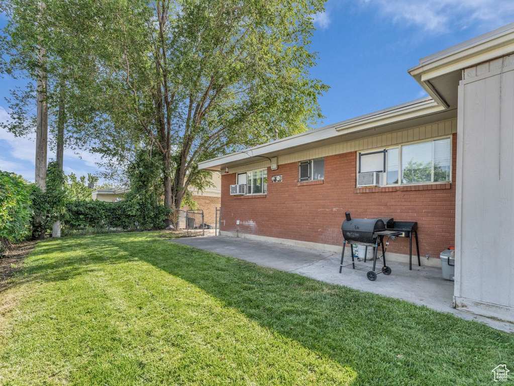 View of yard with a patio area