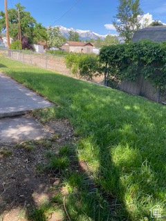 View of yard with a mountain view