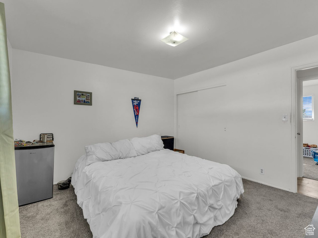 View of carpeted bedroom
