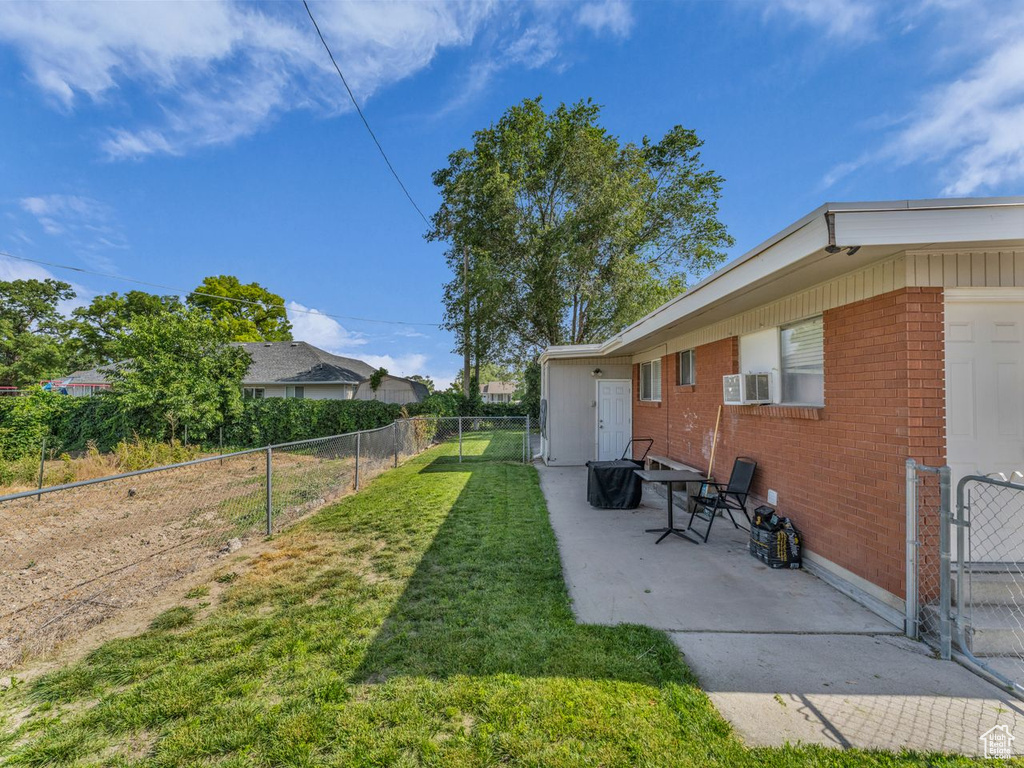 View of yard with a patio