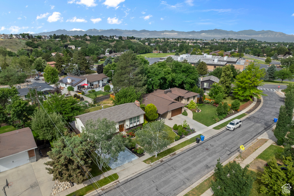 Aerial view of residential area with a mountain backdrop