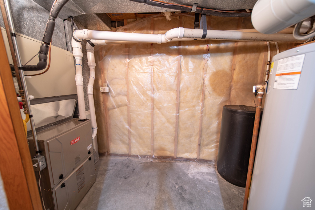Utilities featuring gas water heater and heating unit