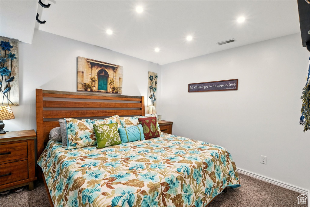 Carpeted bedroom featuring recessed lighting