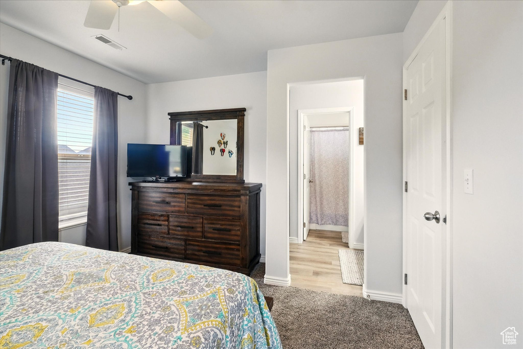 Bedroom featuring carpet flooring and a ceiling fan