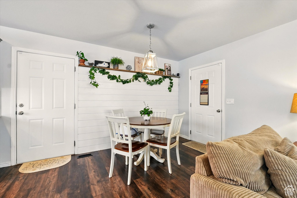 Dining space with wood finished floors