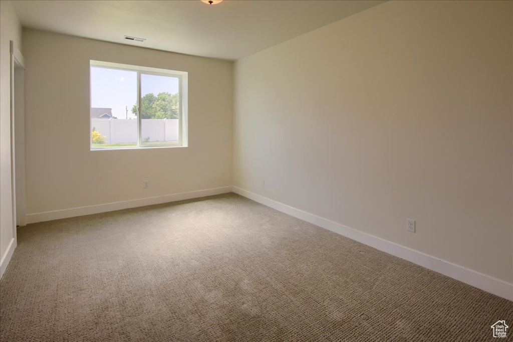 Unfurnished room featuring carpet floors