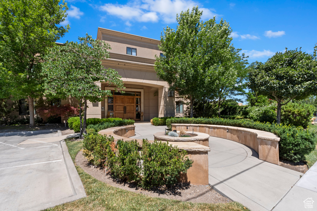 View of front of property featuring stucco siding