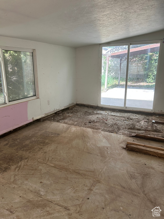 Spare room featuring a textured ceiling