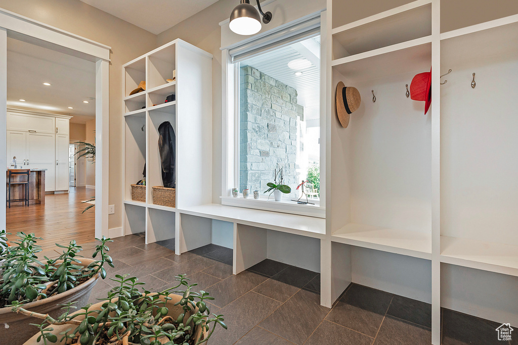 Mudroom featuring recessed lighting and baseboards