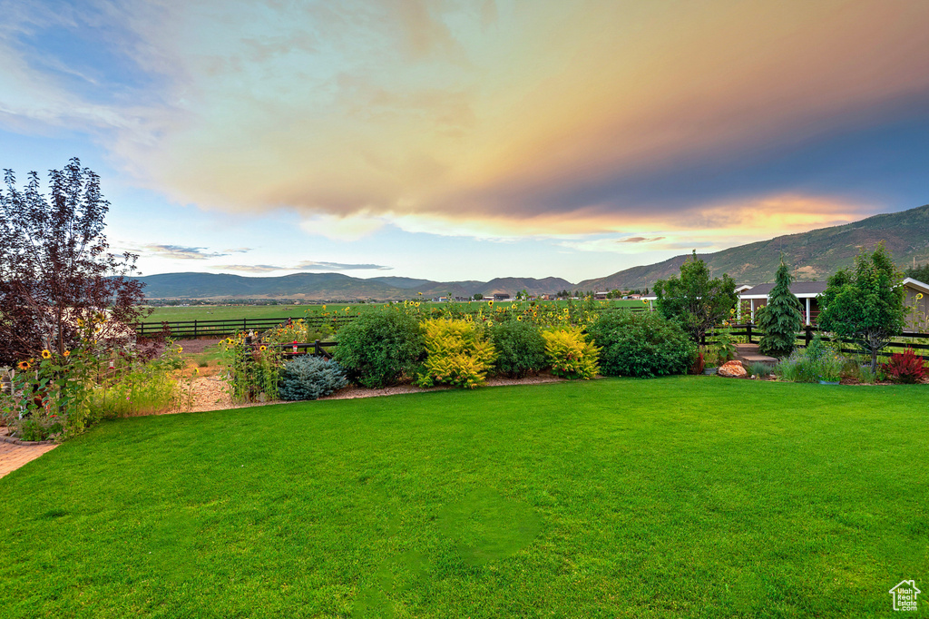 View of yard with a mountain view