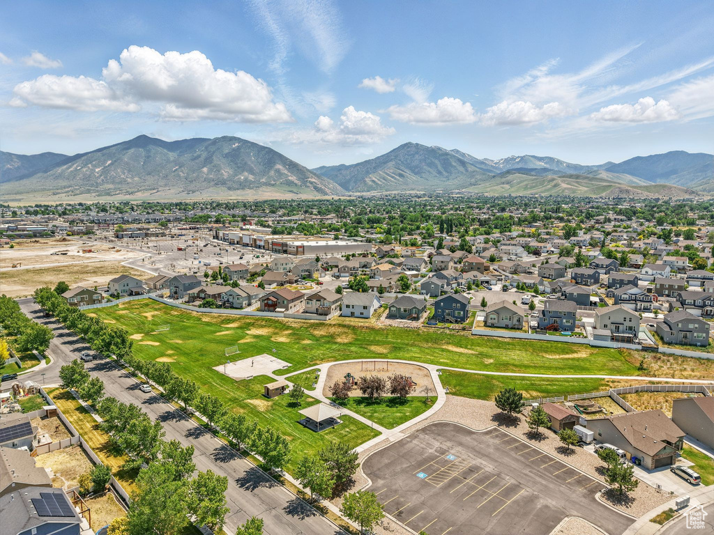 Aerial view of residential area featuring mountains