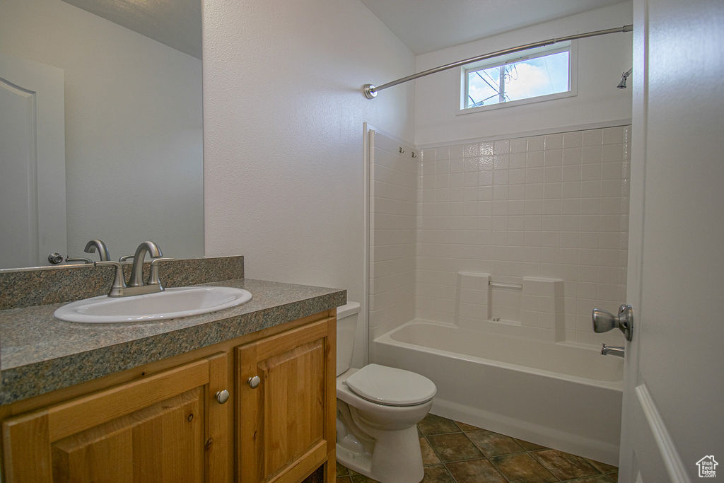 Bathroom with vanity and  shower combination