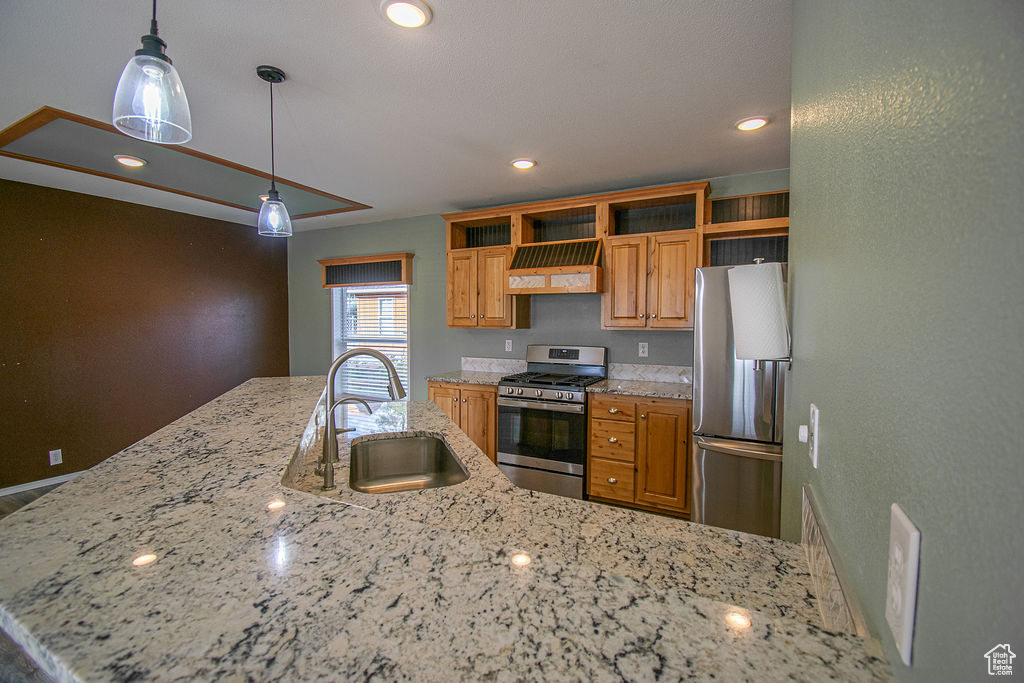 Kitchen featuring appliances with stainless steel finishes, open shelves, custom exhaust hood, pendant lighting, and recessed lighting