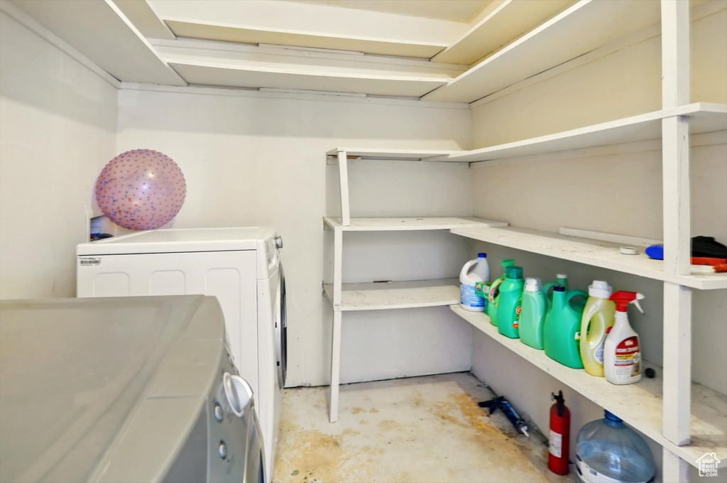 Washroom featuring washer and dryer
