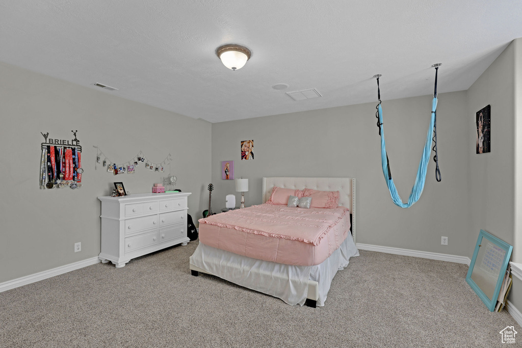 Bedroom featuring carpet flooring