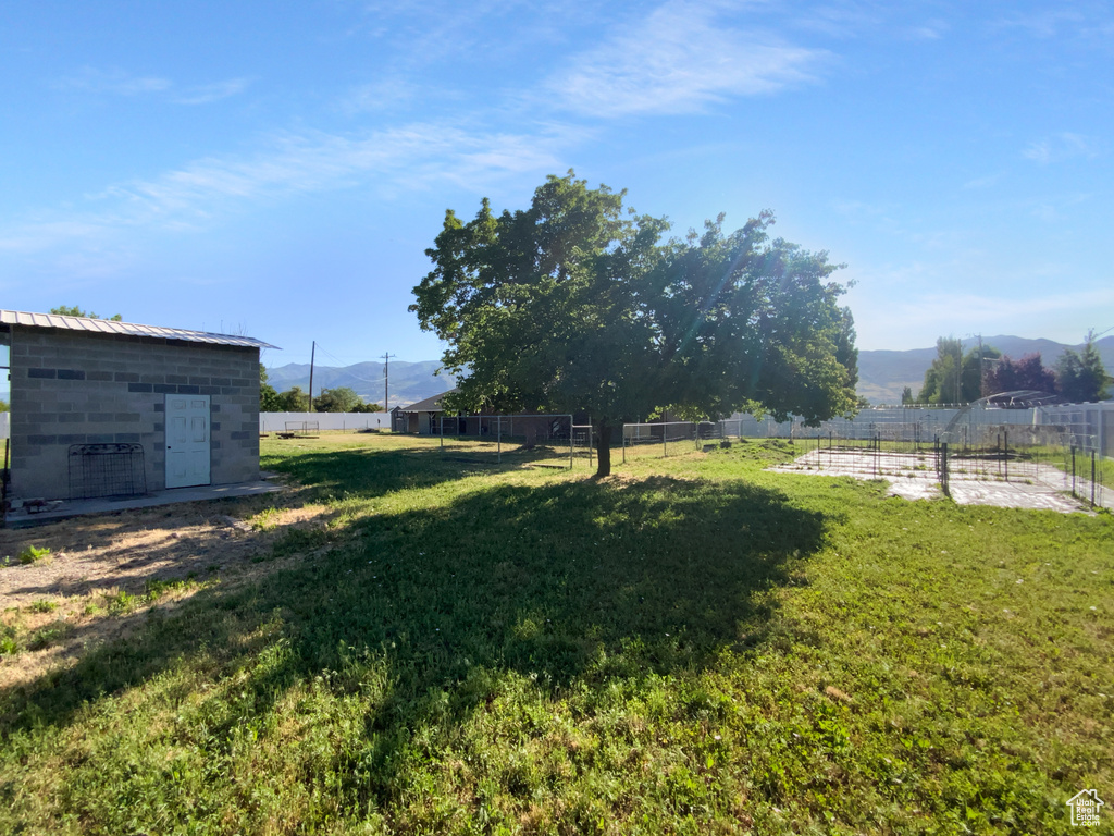 View of yard with a mountain view