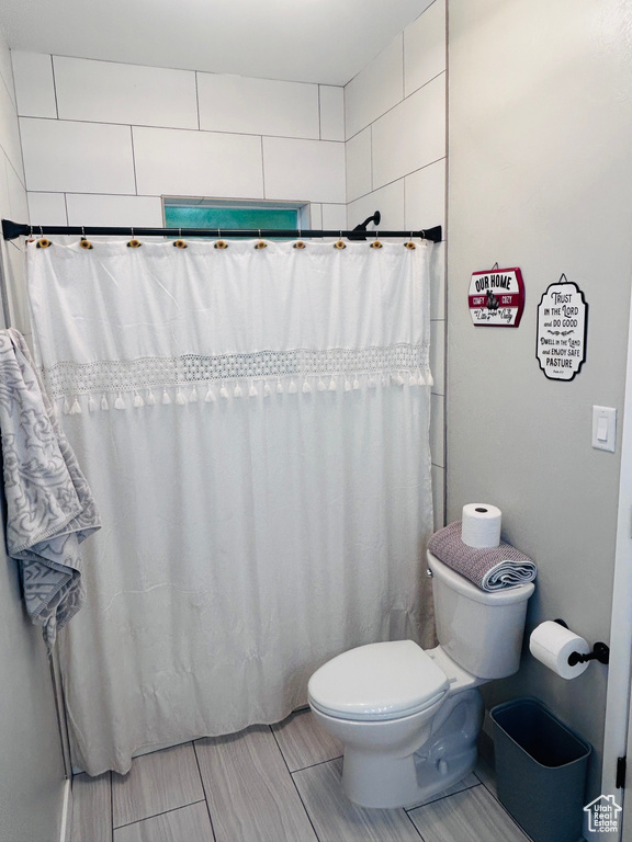 Full bathroom with toilet