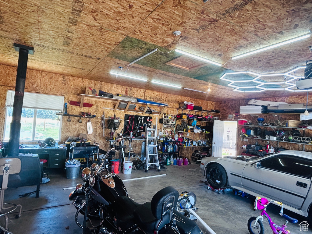 Garage featuring a workshop area