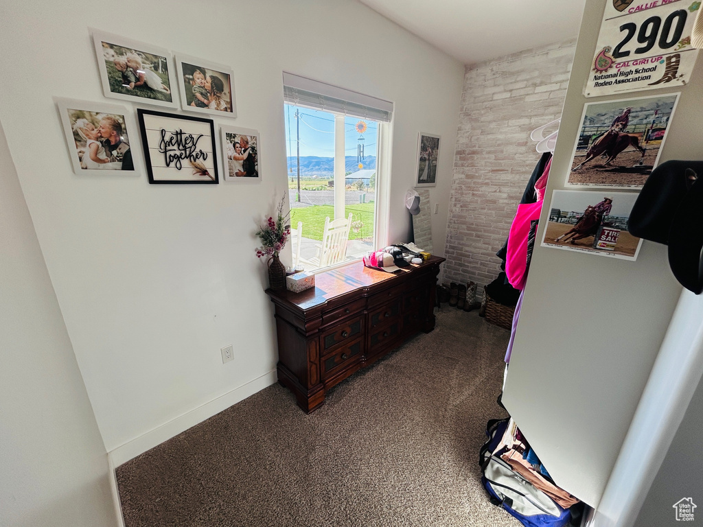 Office area with carpet flooring and baseboards