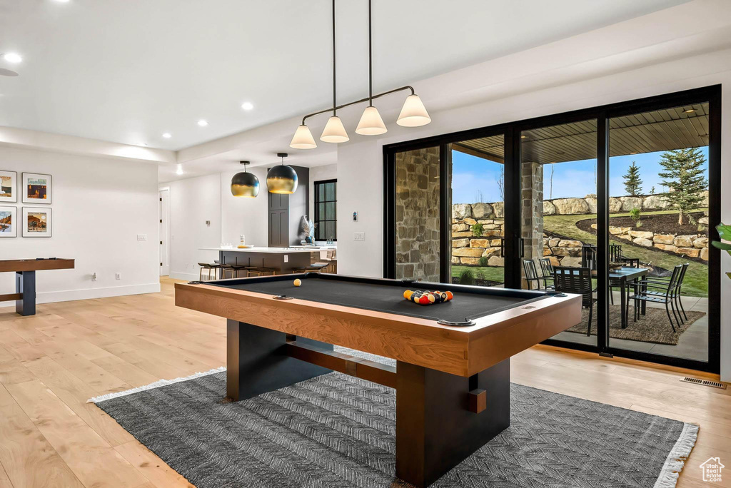 Playroom featuring light wood finished floors, recessed lighting, and pool table