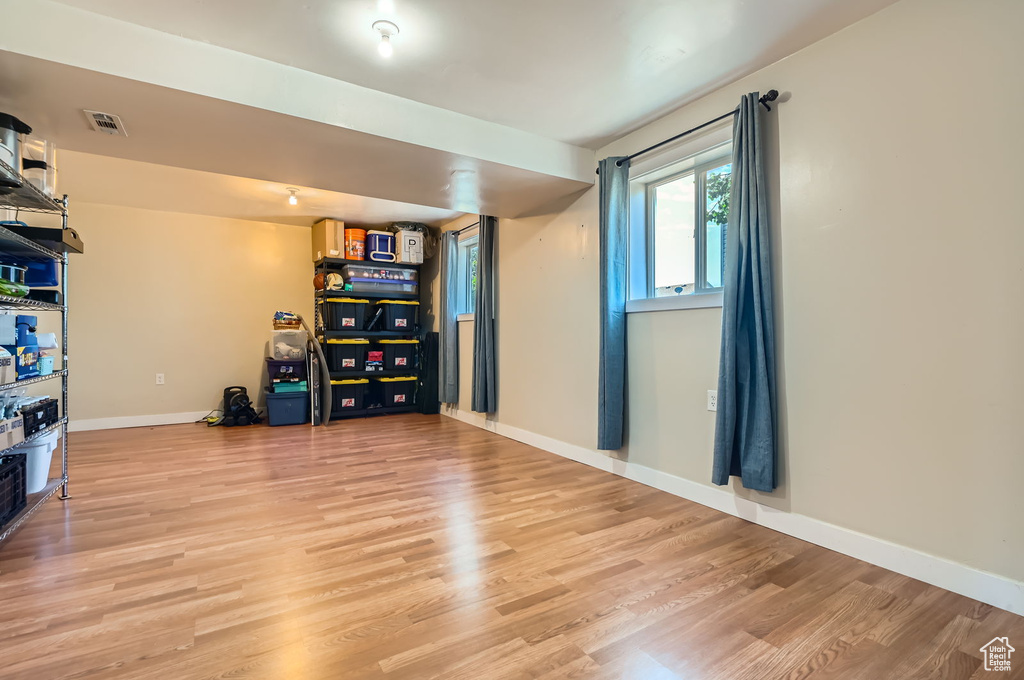 Interior space featuring light wood-type flooring and baseboards