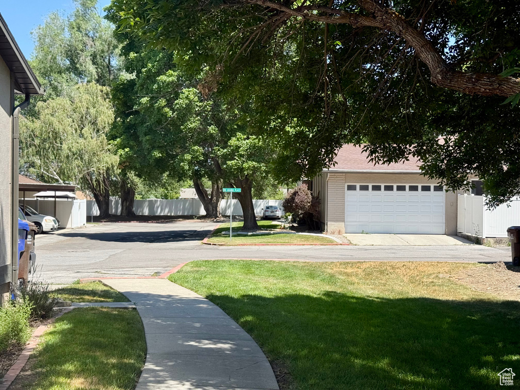 View of yard featuring a garage