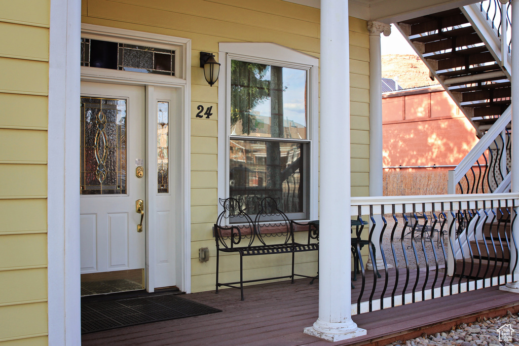 Entrance to property featuring a porch